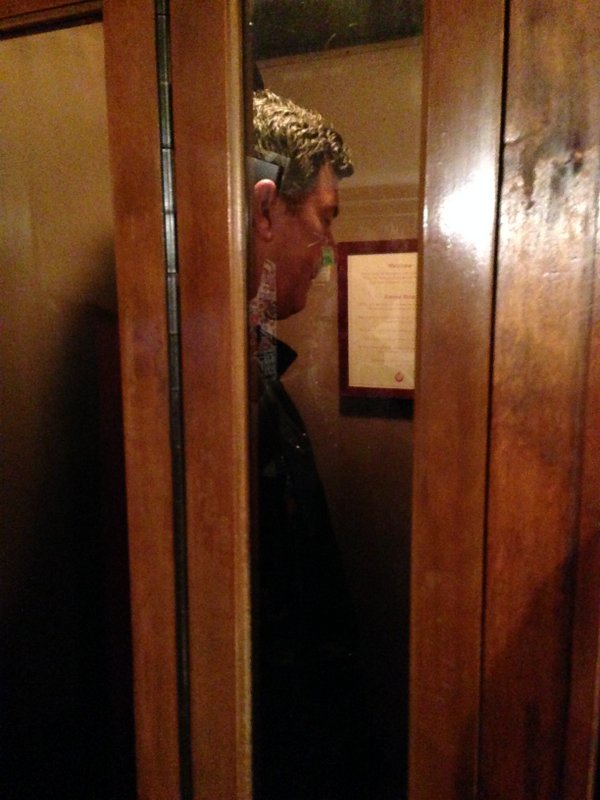 Our friend John in the portal to PDT in Crif Dog on St. Marks Place. Got all that?