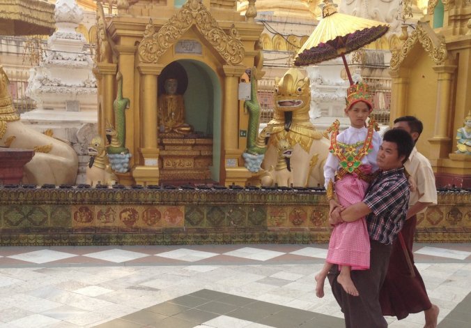 I must say, the little feller looks rather unexcited about being carried around and shaded. 