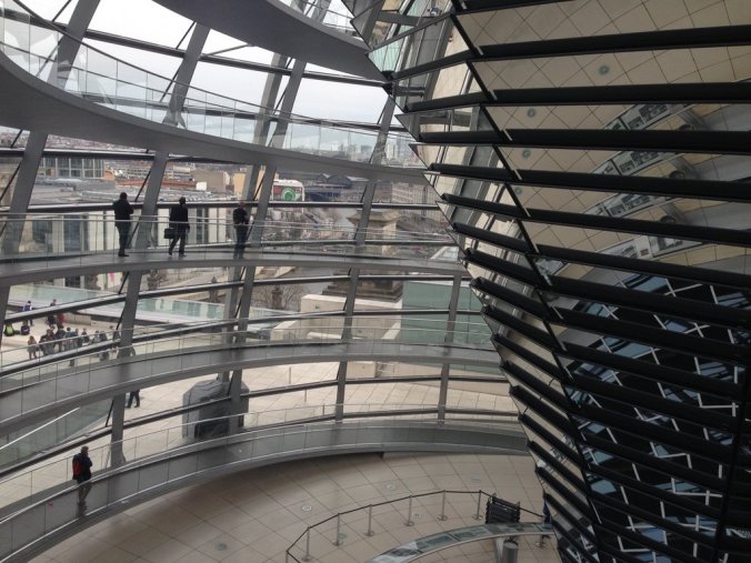 The funhouse mirror effect of standing in the dome of the Reichstag.